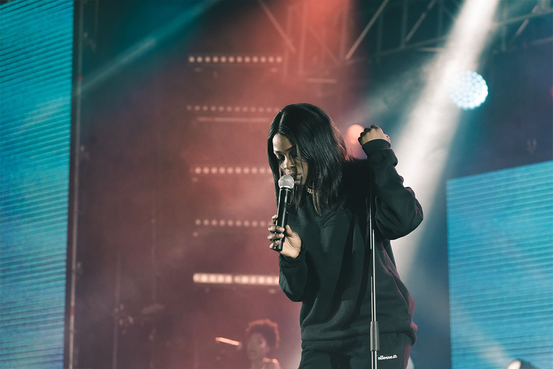 Elsy Wameyo performing at Grooving the Moo